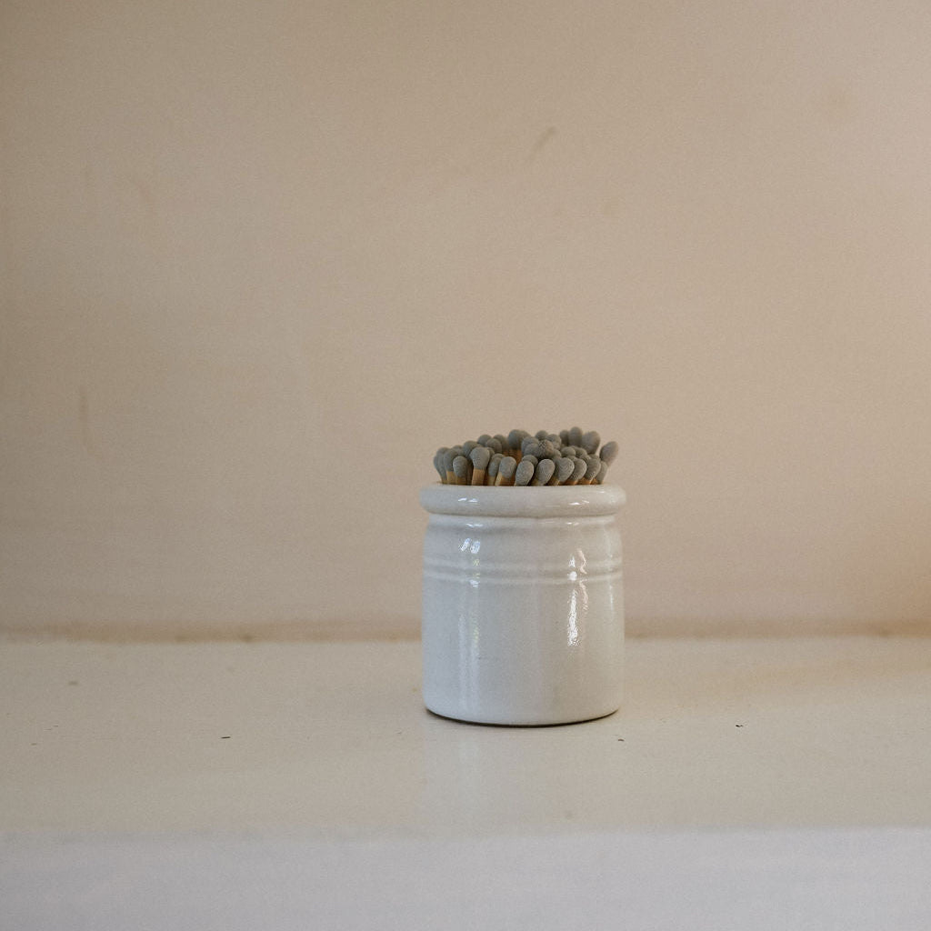 vintage crock pot match striker