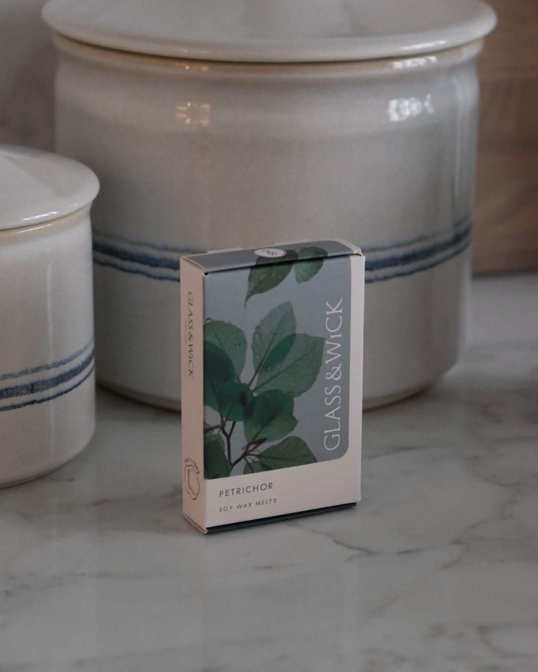box of petrichor wax melts by glass and wick